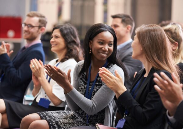 Attendees networking and exchanging ideas at the Cyprus Digital Marketing Summit, blending culture with innovation.