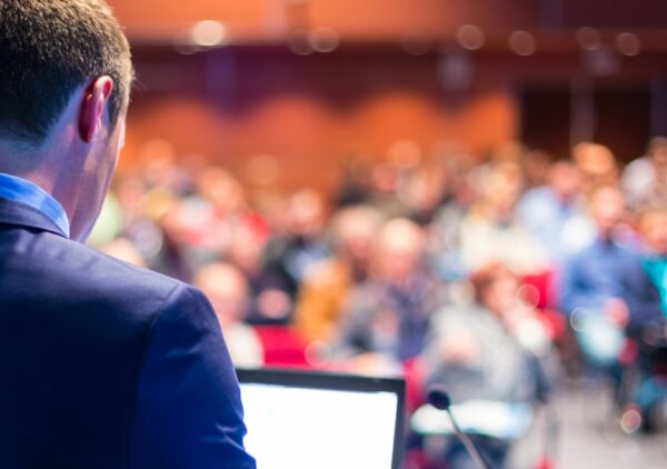 Attendees engaging in sessions and networking at the Cyprus Digital Marketing Summit, showcasing its growing global community.