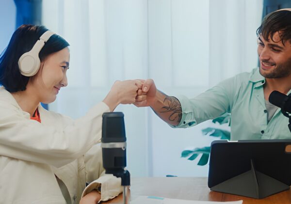 Corporate representatives showcasing their brand at the Cyprus Digital Marketing Summit sponsorship booth.